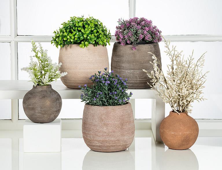 Abbott coarse texture planters styled with plants by a window