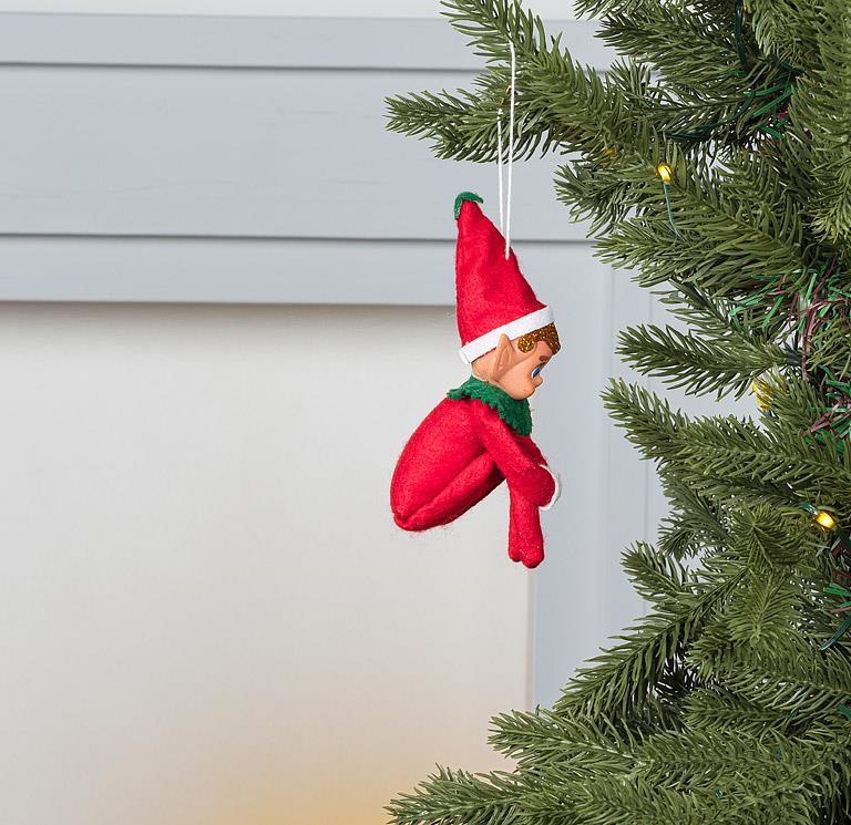 Abbott vintage-style sitting elf ornament on an evergreen branch