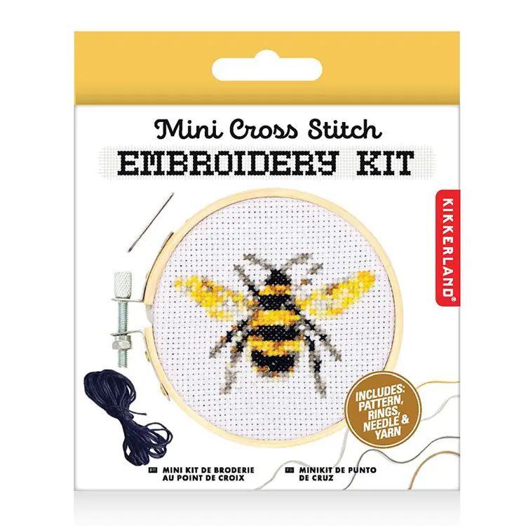 Kikkerland Mini Cross Stitch Embroidery Kit packaging with a bee design on a white background