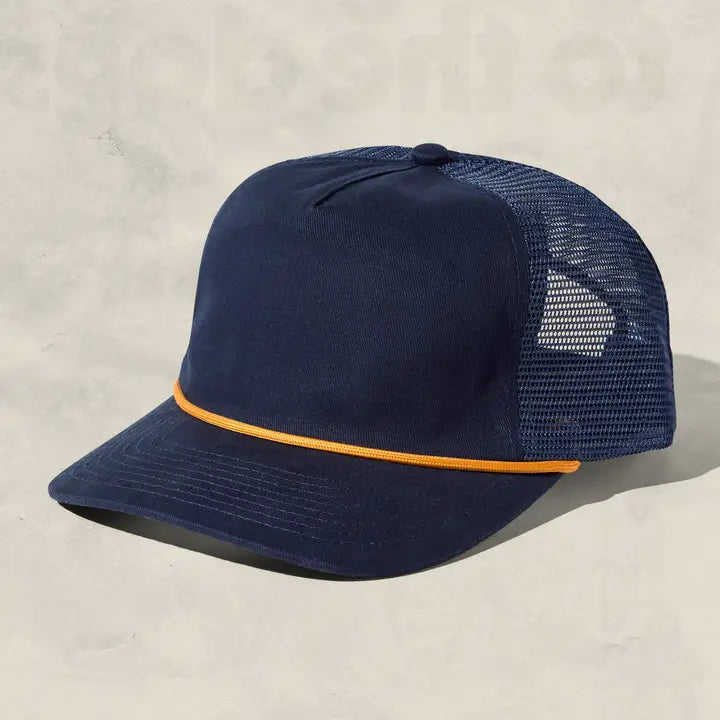 Navy brushed cotton trucker hat with mesh back and gold rope across the brim