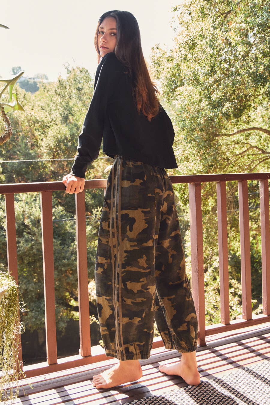 Back view of washed camo drawstring pants