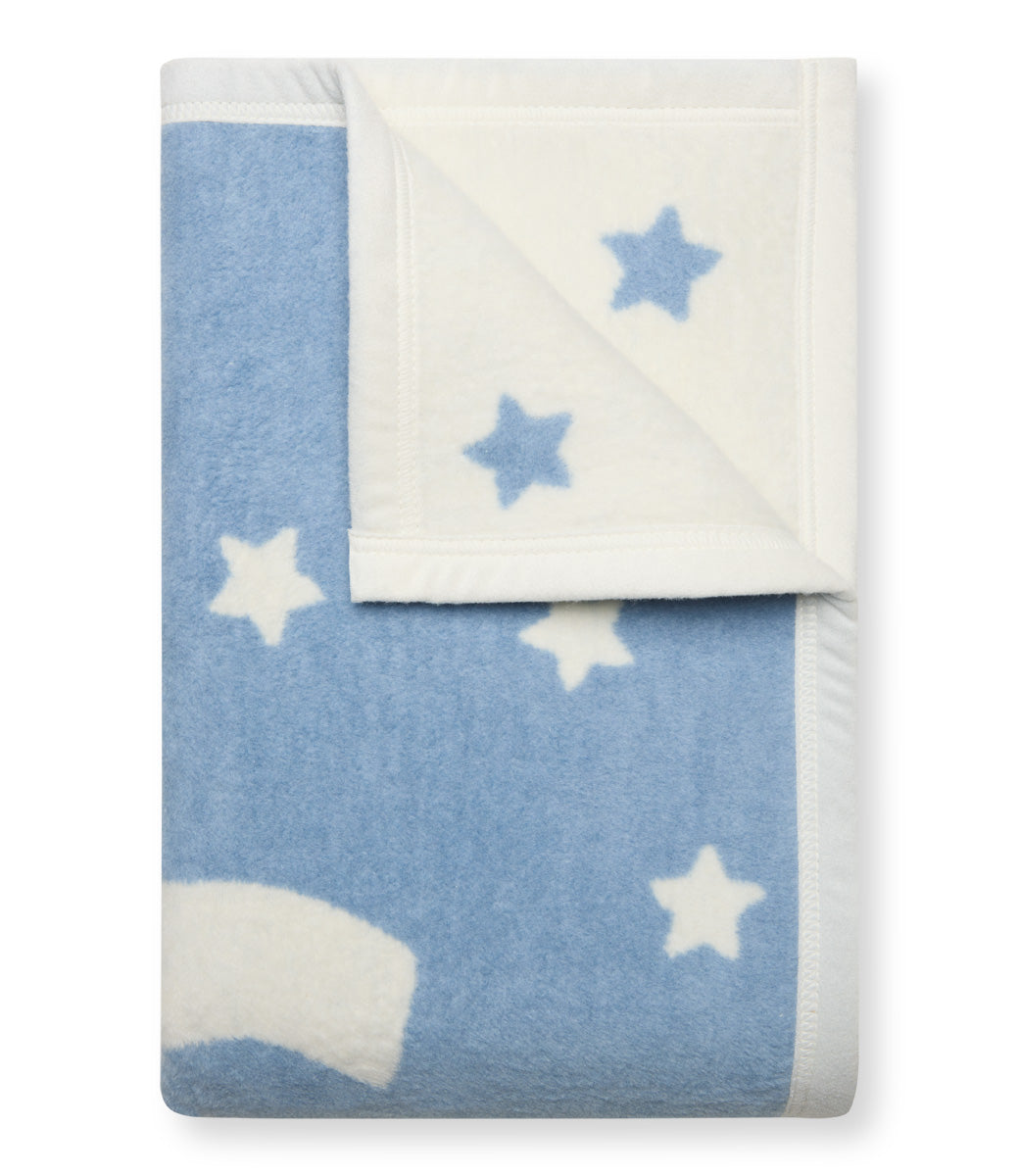 Folded Chappywrap Big Bro Midi Blanket showing the reversible cream side with blue stars