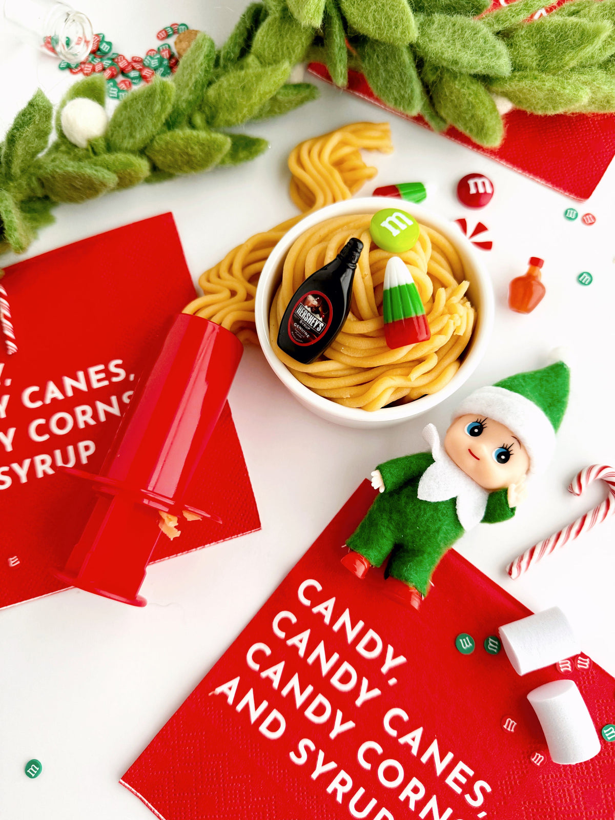 Earth Grown KidDoughs Elf Breakfast KidDough Play Kit play scene with candy canes and treats