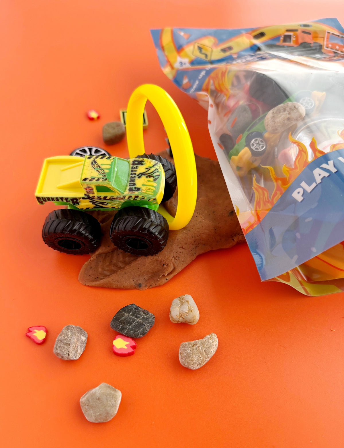 Earth Grown KidDoughs Monster Truck KidDough Play Kit close-up of the pouch and monster trucks