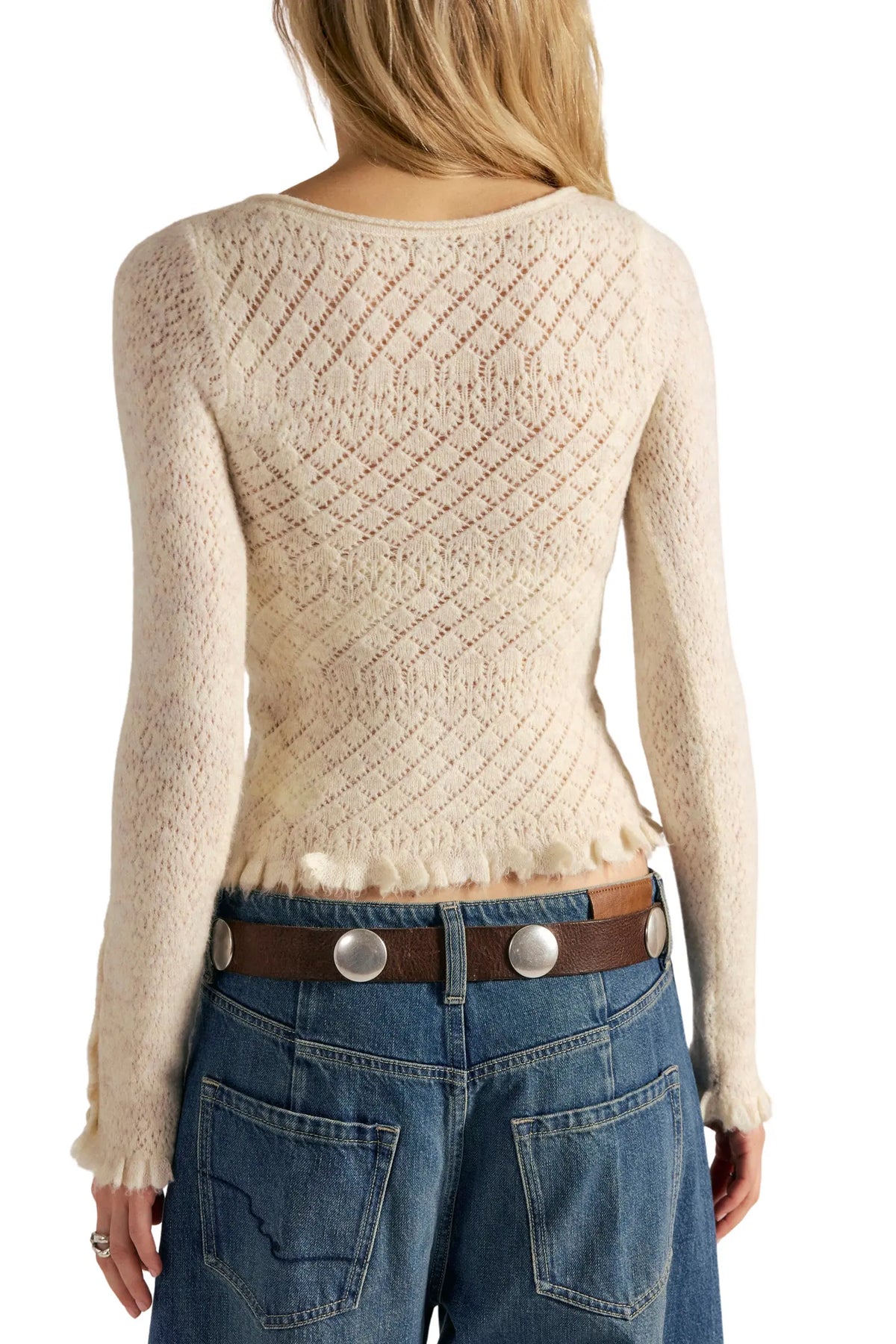 Back view of the Free People Love Cardi in winter white, showing the diamond pointelle knit and ruffle hem
