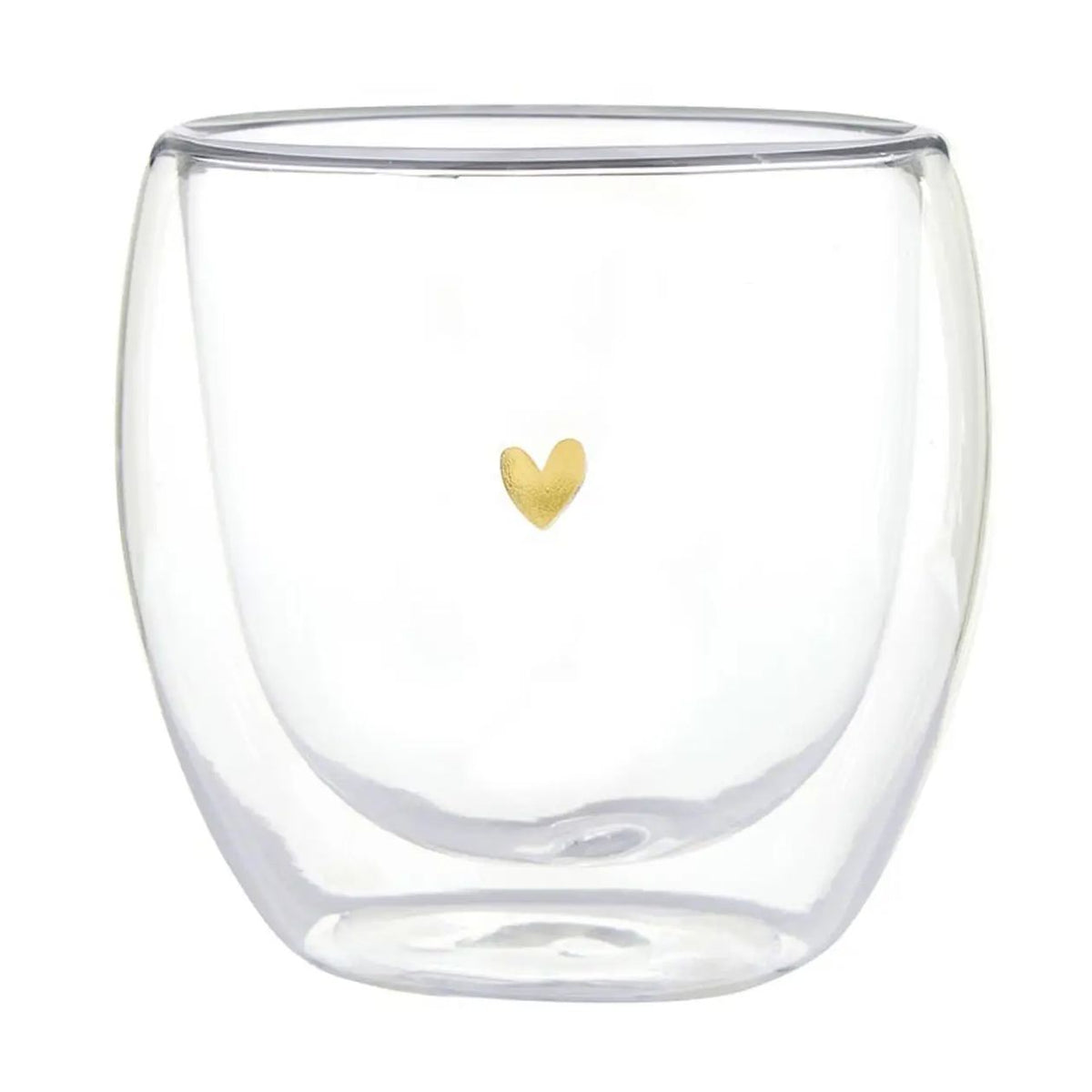 Clear glass tumbler with a gold heart on a white background