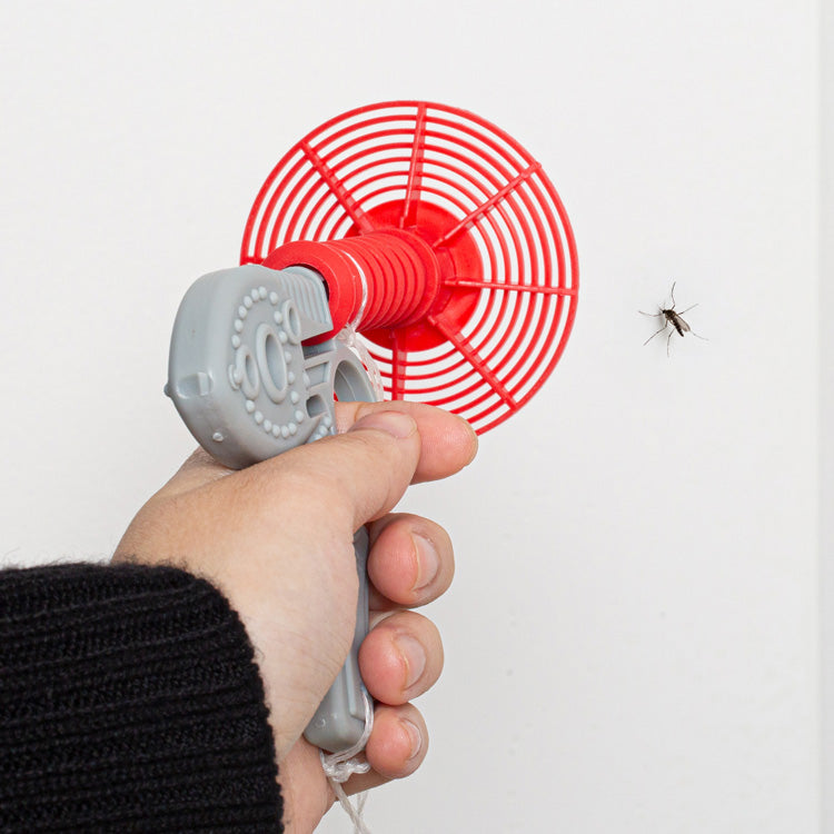 Hand using the Kikkerland Bug Blaster
