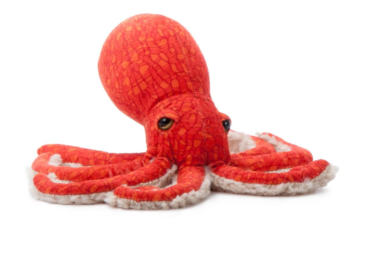 Red plush octopus toy on a white background