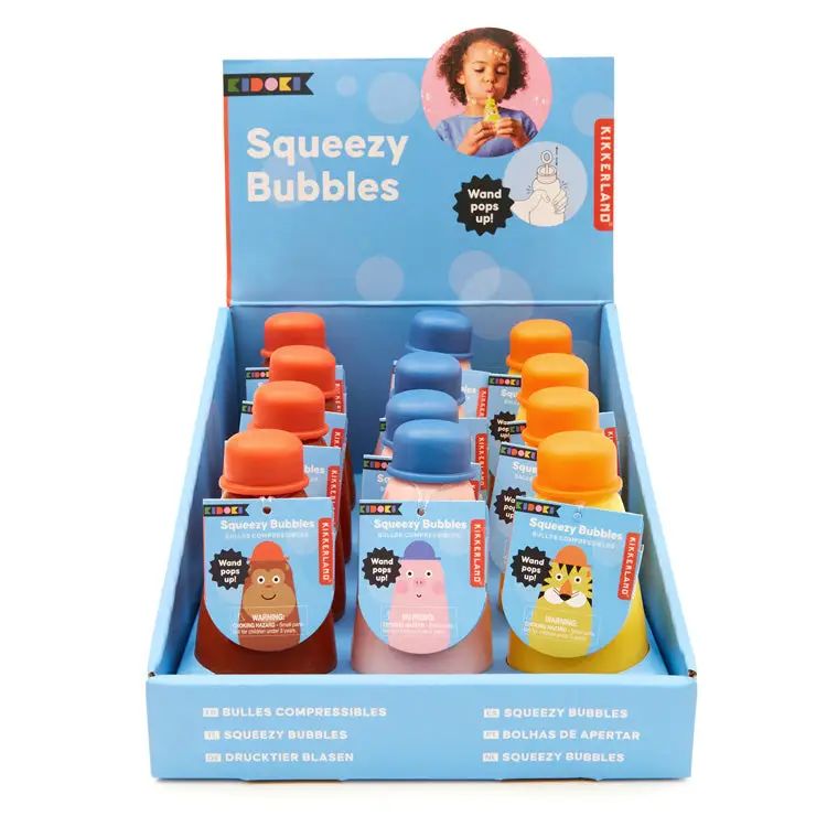 Display of Kiboomer Squeezy Bubbles bottles in a blue packaging box.