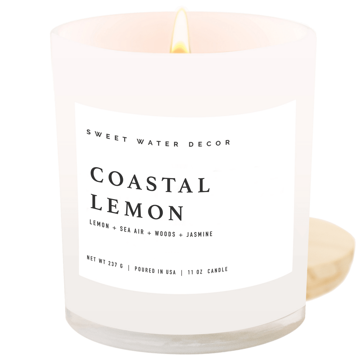 Sweet Water Decor Coastal Lemon 11 oz soy candle in a white jar with wood lid on a white background