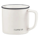 White mug with black rim and 'I LOVE US' text on a white background