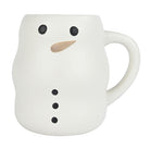 A white ceramic mug shaped like a snowman, featuring black dot eyes and buttons, a natural light wood carrot nose, and a white handle on a plain white background.