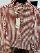 Instore picture of red striped blouse