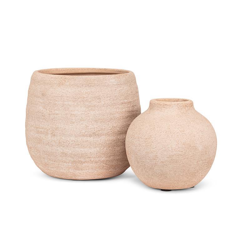 Abbott beige coarse texture planter shown with a matching vase