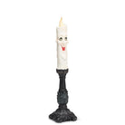 Abbott Happy Candle Halloween LED candlestick on black base, side view