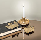 Abbott gold maple leaf tray styled with a candle