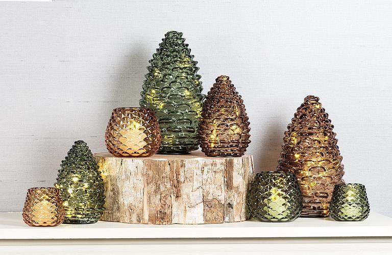 Abbott glass pinecone tealights and lights styled on a birch log