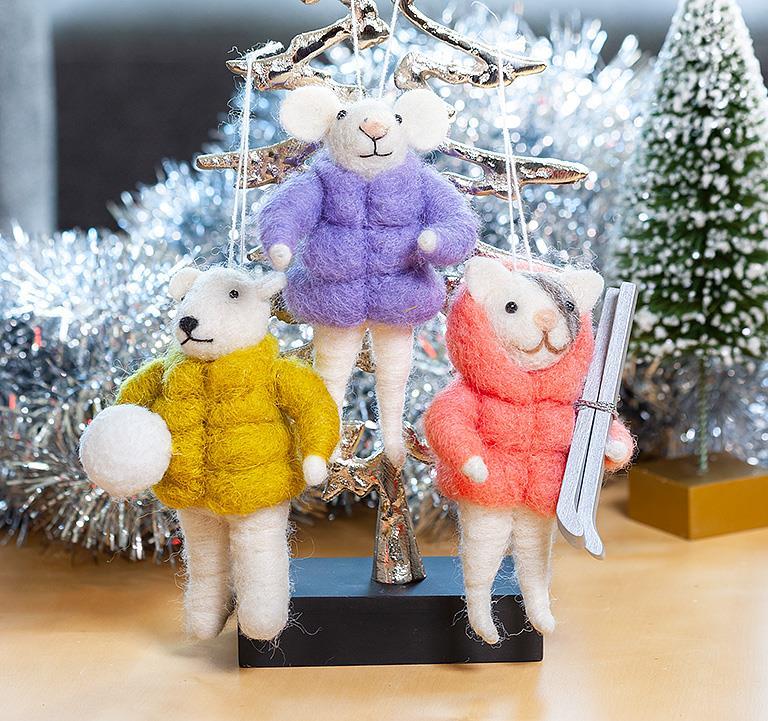 Abbott puffy coat animal ornaments hanging on a Christmas tree