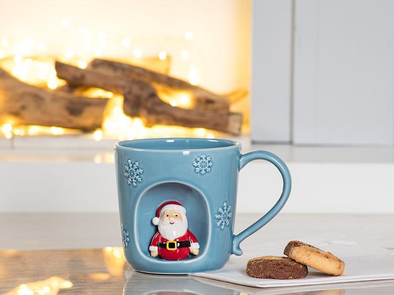 Abbott snowflake mug with Santa by the fireplace with cookies