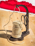 Abbott cast iron twine holder with scissors used for gift wrapping