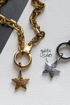 Air and Anchor Look Up Little Star pendants shown on cuff keeper chains