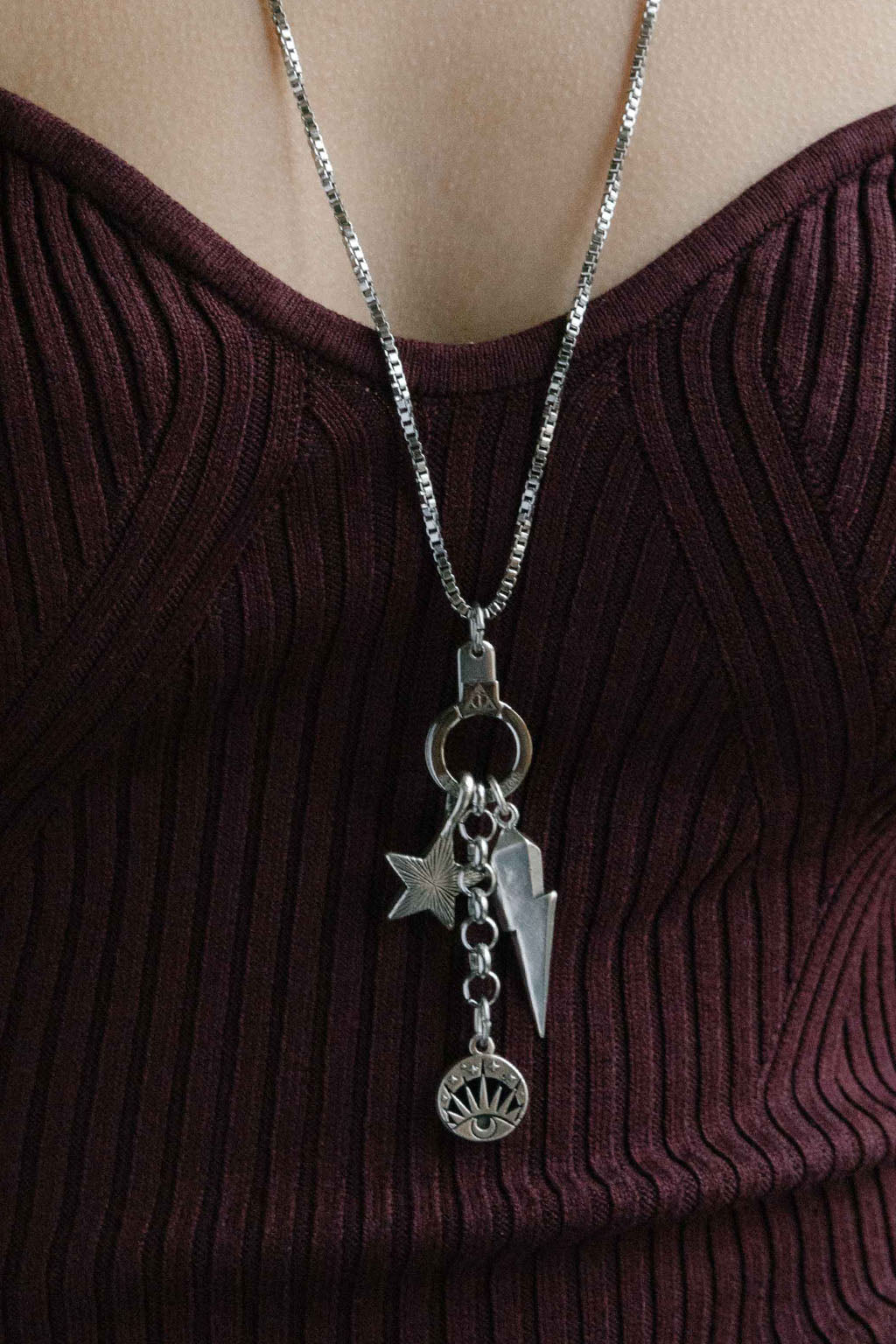 Model wearing the Air and Anchor When Lightning Strikes pendant necklace