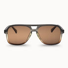 Sunglasses with brown lenses and black frame on a white background