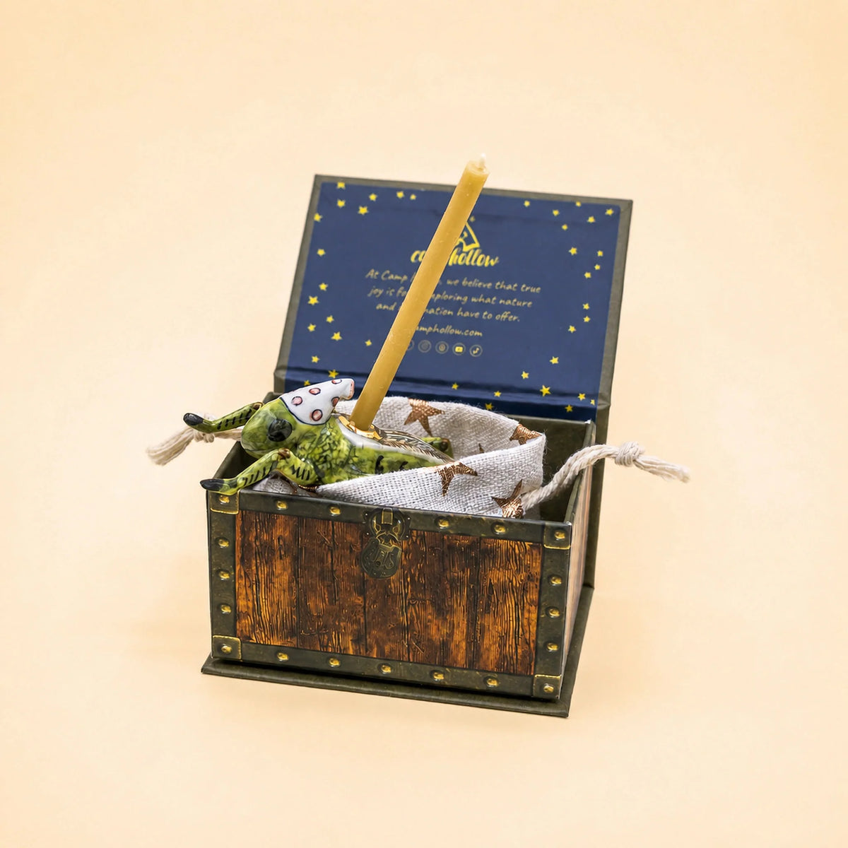 Camp Hollow cricket cake topper in its keepsake gift box