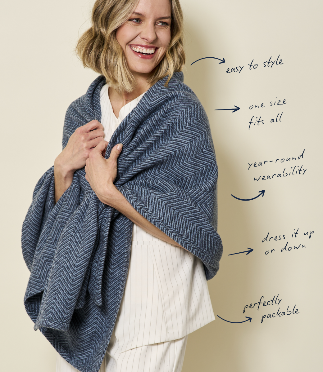 Woman wearing the Chappywrap Bayside Herringbone Shawl in Midnight navy
