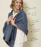 Woman wearing the Chappywrap Bayside Herringbone Shawl in Midnight navy