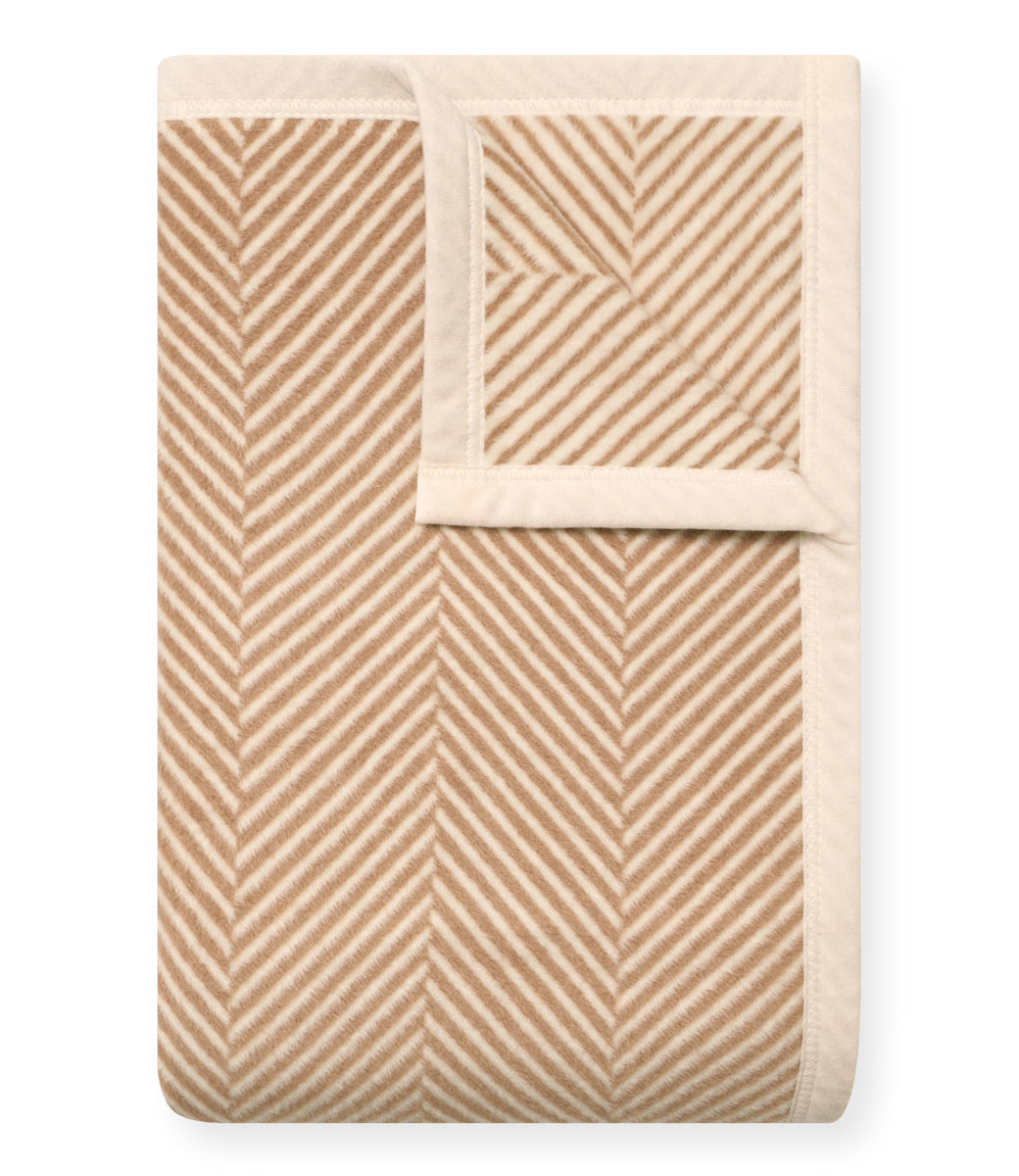 Folded Chappywrap Harborview Herringbone Blanket in tan with cream reverse and border