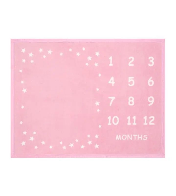 Pink milestone blanket with white numbers and stars