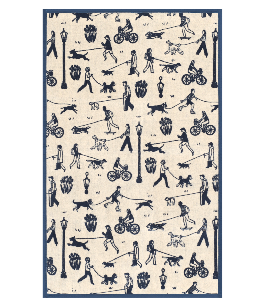 Full view of the Chappywrap Parkside Pups Midi Blanket, a navy and cream dog-walking print