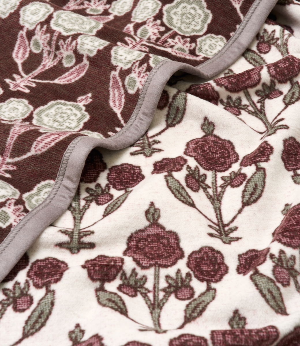 Close-up of the floral blockprint pattern on the Chappywrap Ruthie Blockprint Blanket