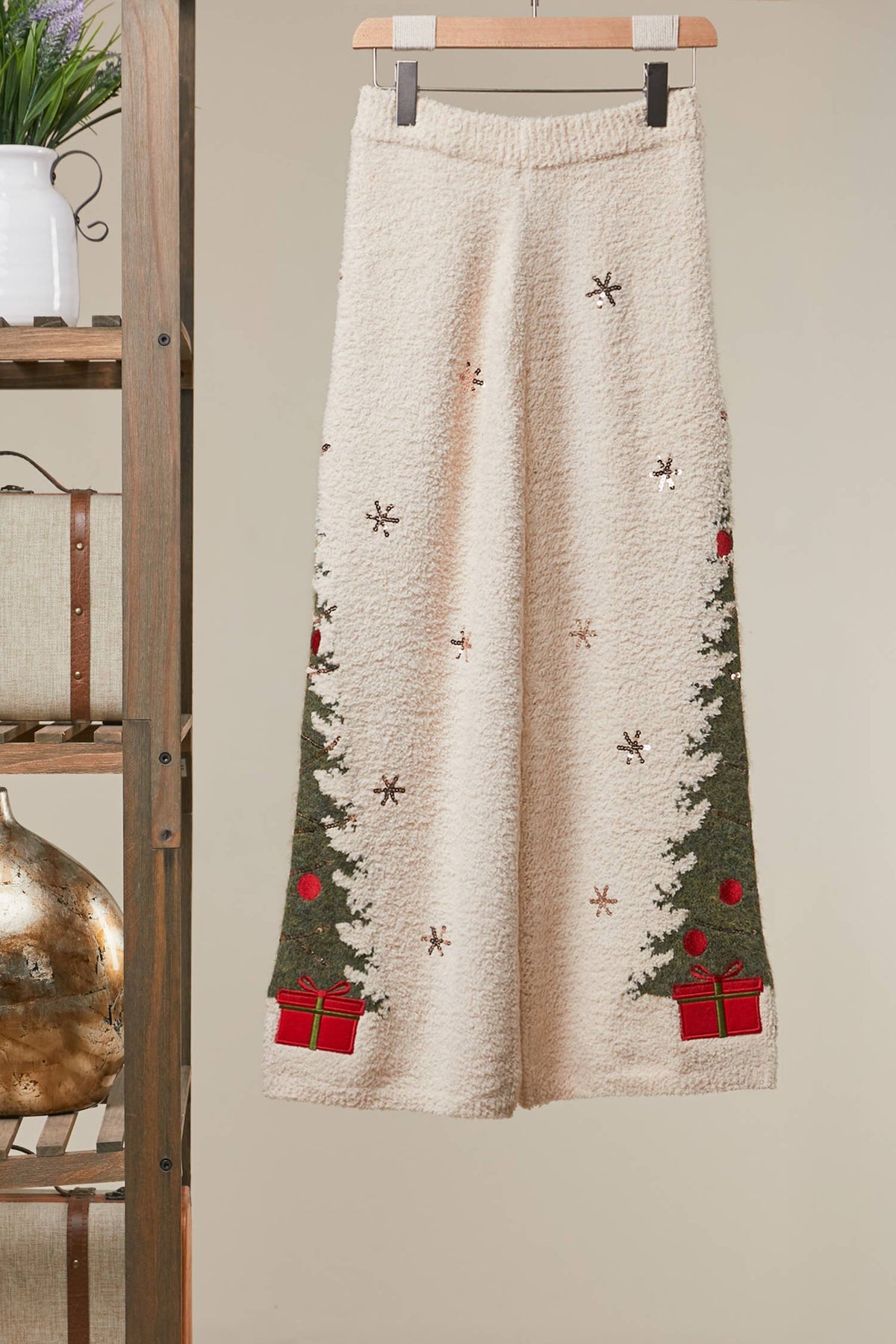 Back view of the ivory Christmas Tree Sweater Pants with embroidered trees and snowflakes