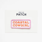 Iron-on patch with 'Coastal Cowgirl' text on a white background
