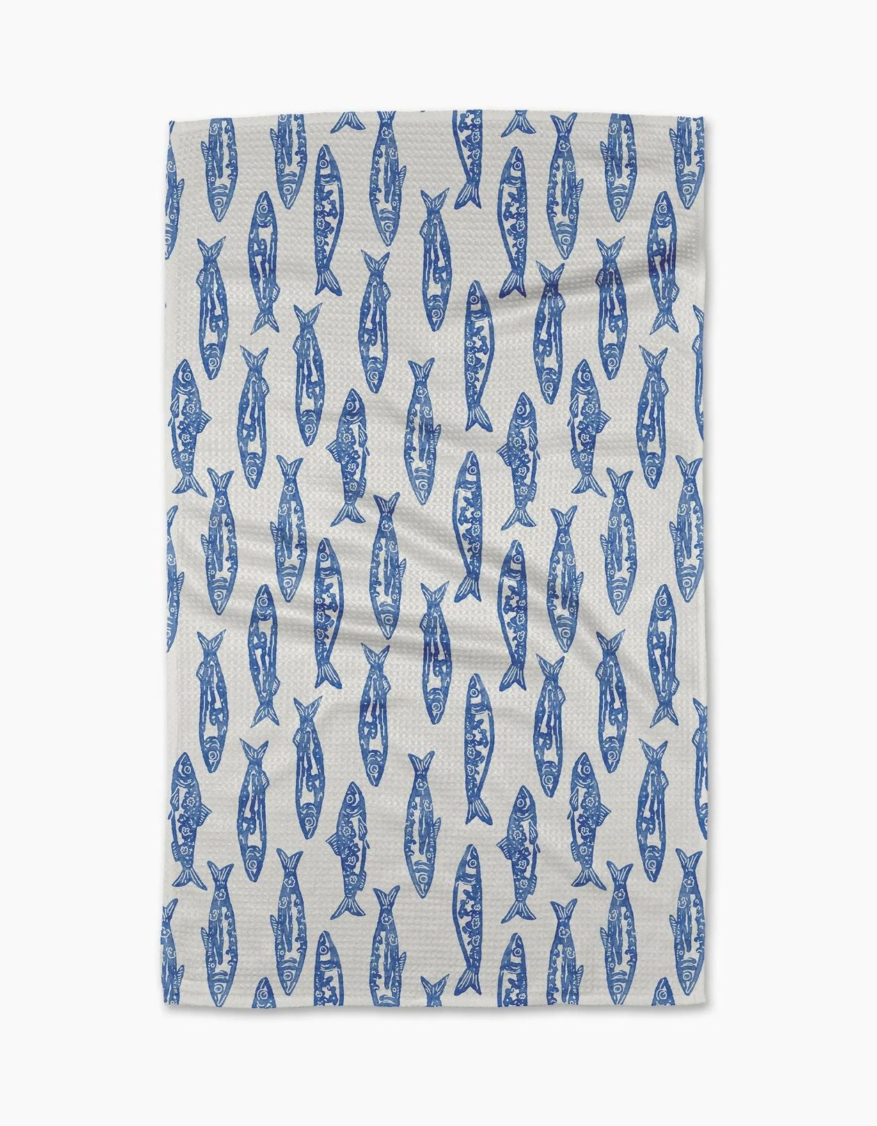 dish towel with a repeating blue fish pattern, laid flat against a clean white background.
