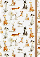 A notebook or journal with a white cover covered in a repeating watercolor-style print of various dog breeds. A brown elastic closure band is visible on the right side.