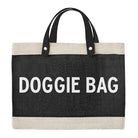Black tote bag with 'DOGGIE BAG' text on a white background