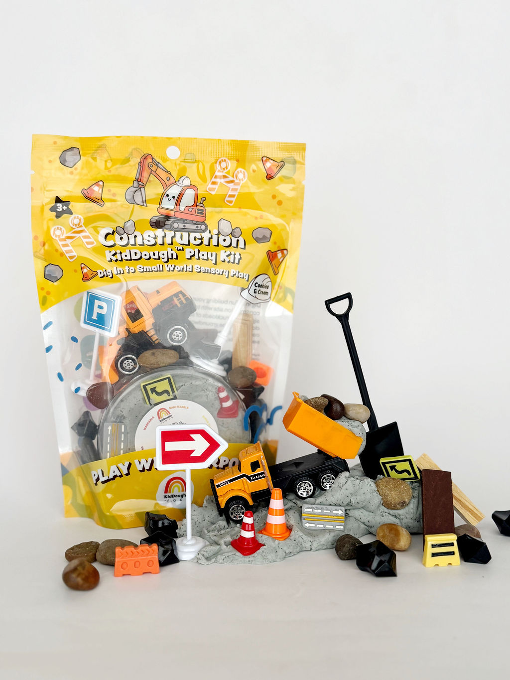 Earth Grown KidDoughs Construction KidDough Play Kit package with trucks and construction signs on white