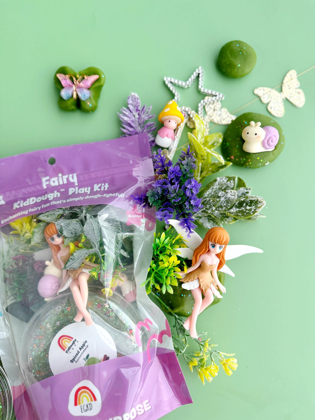 Earth Grown KidDoughs Fairy KidDough Play Kit with fairy figures, flowers and play dough on green