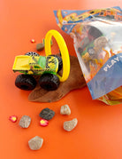 Earth Grown KidDoughs Monster Truck KidDough Play Kit close-up of the pouch and monster trucks