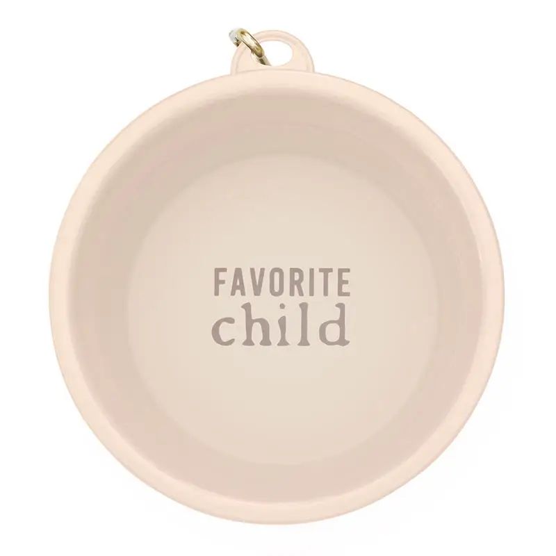 Round beige plate with 'Favorite child' text on a white background