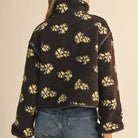 Back view of the &merci Floral Sherpa Jacket in brown sherpa with butter-yellow floral print