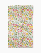 Floral patterned dishtowel with pink, yellow, and green flowers on a white background