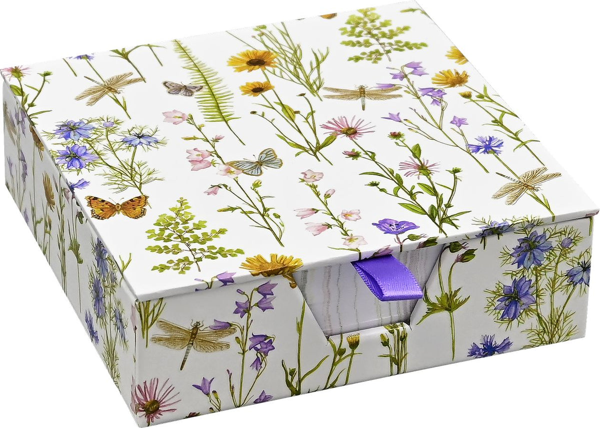 Decorative box with floral and insect design on a white background