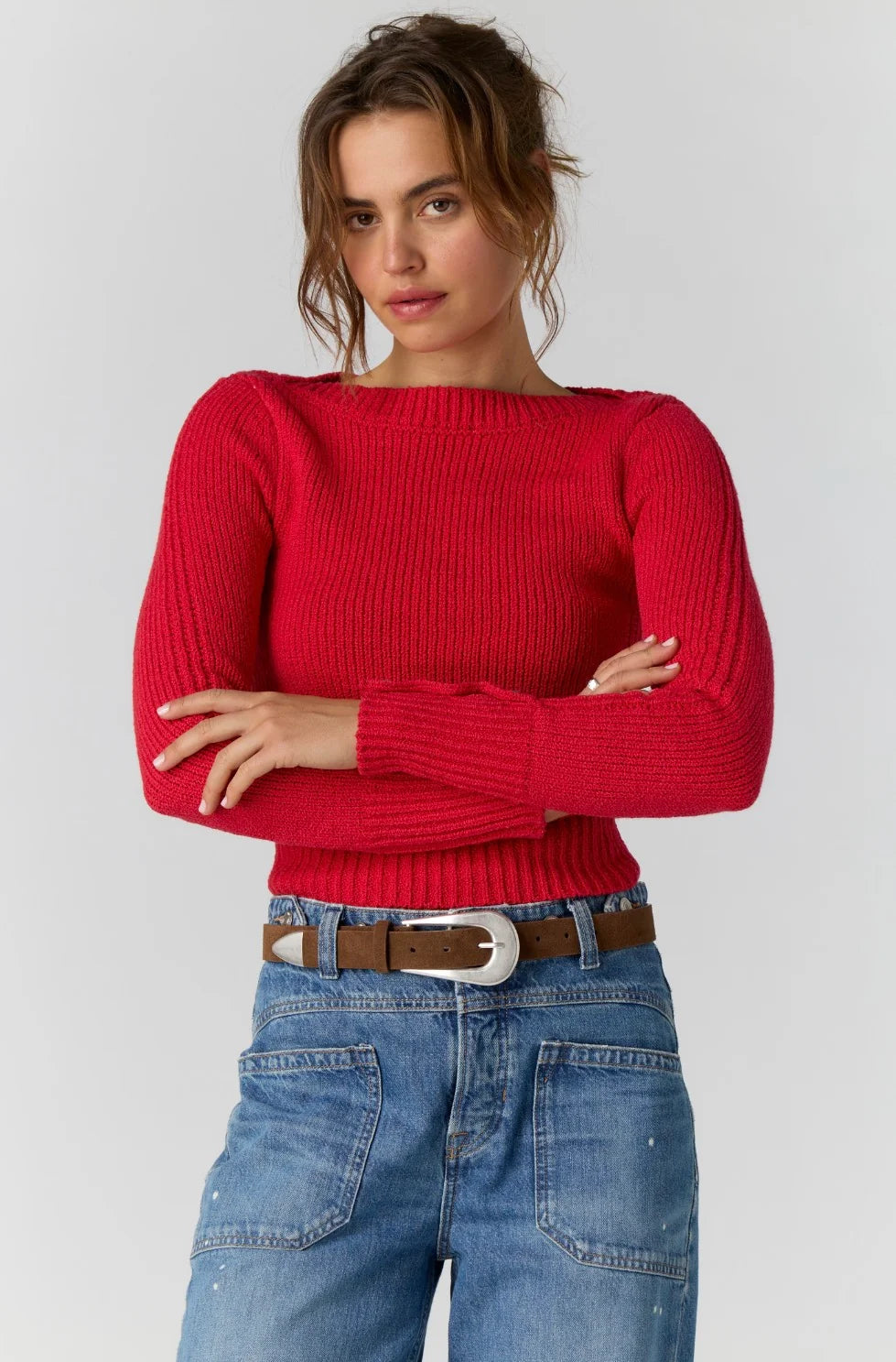 Model wearing the Free People Mila Pullover in salsa red, a cropped ribbed boatneck sweater, front view