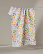 Geometry Blooming Days tea towel laid flat showing the full floral print