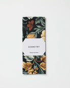 Geometry Classic Floral tea towel folded in its gift-ready Geometry packaging