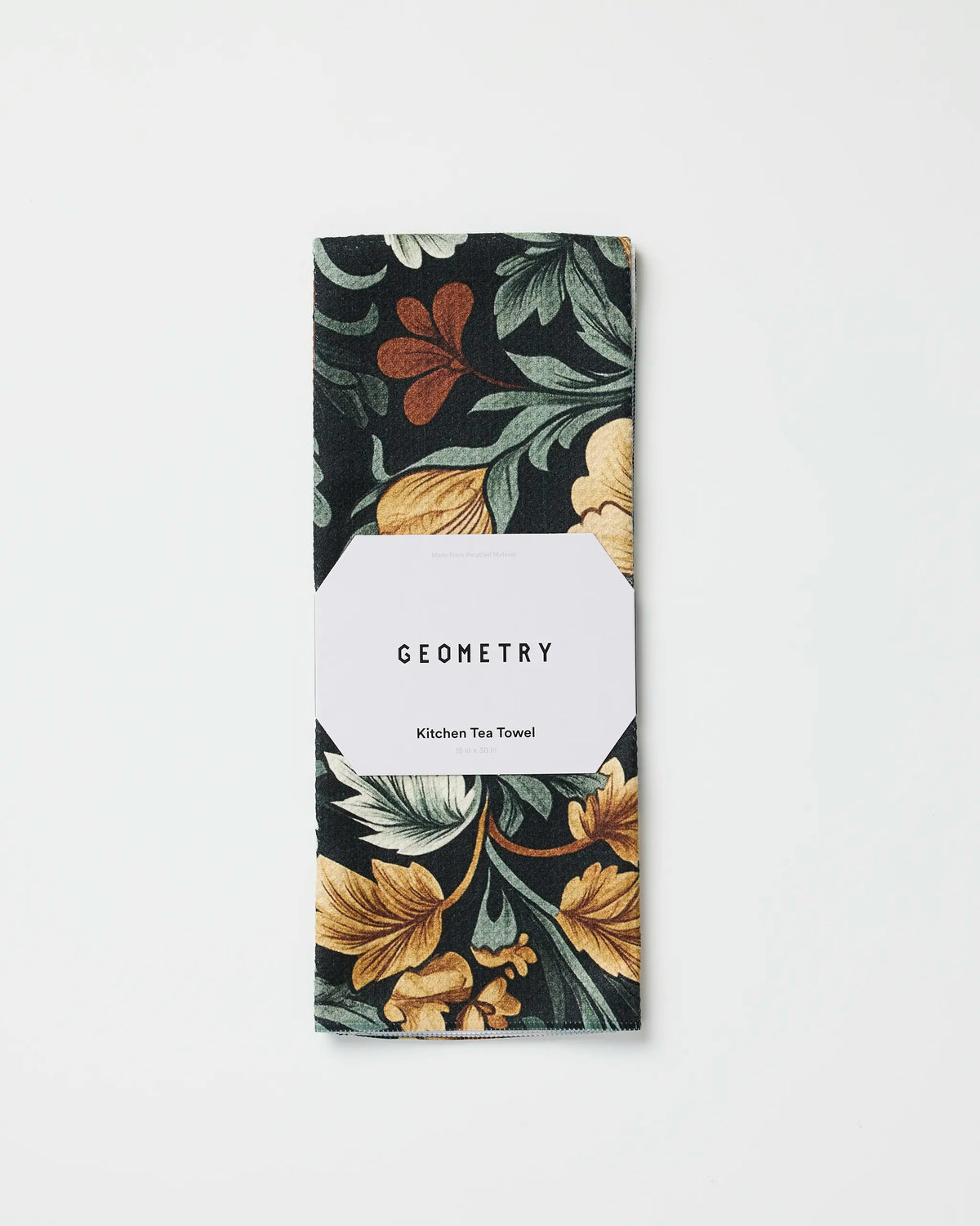 Geometry Classic Floral tea towel folded in its gift-ready Geometry packaging